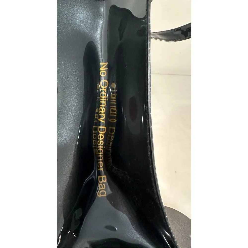 Ted Baker London Icon vinyl handbag with gold bow.    M-0927